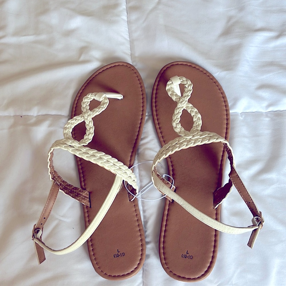 Ladies size 10, cream sandals. New without tag.